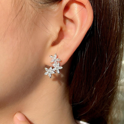 cubic zirconia flower stud earrings worn by model