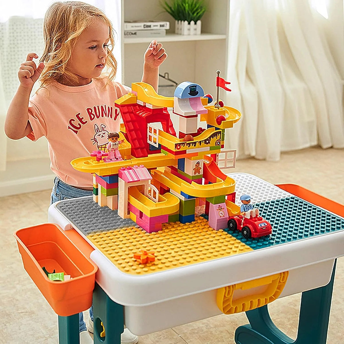 Kids Table and Chair Set with Storage child playing at table